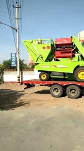 宇田(tian)穗茎兼收玉米收获机到达(da)饶阳紫阳农机(ji)公司